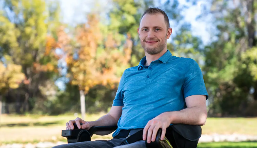 Patient in motorized wheelchair